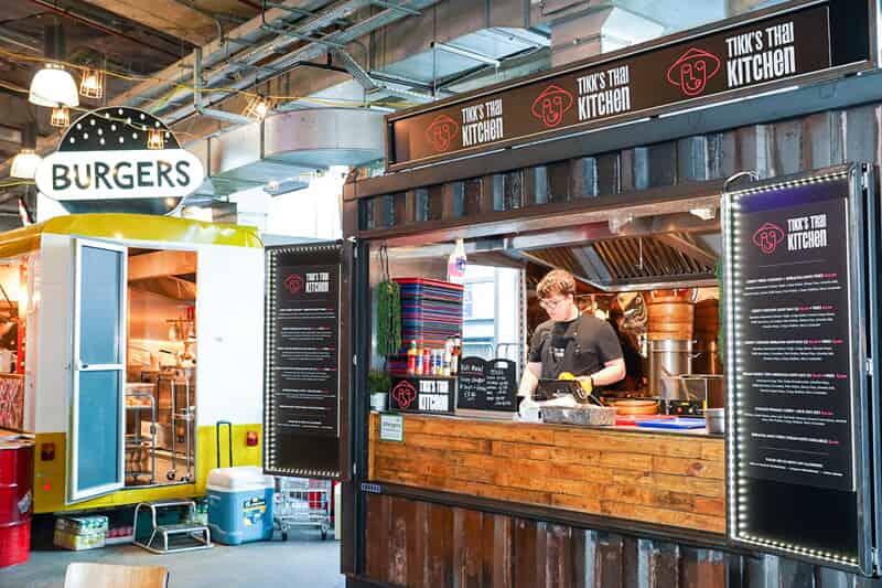 An image of interior signage for Tikk's Thai Kitchen.